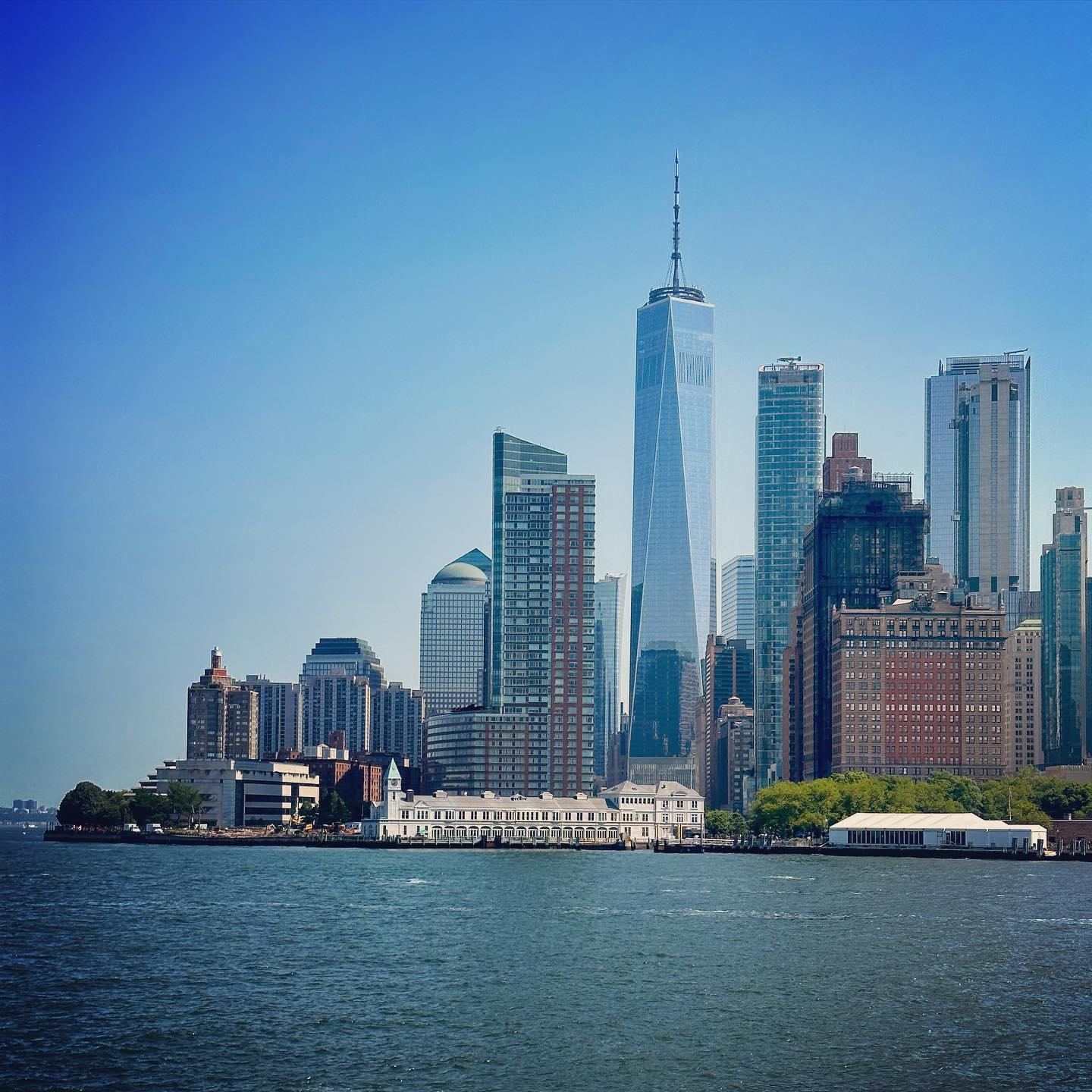 One World Trade Center rises above the waterfront skyline.