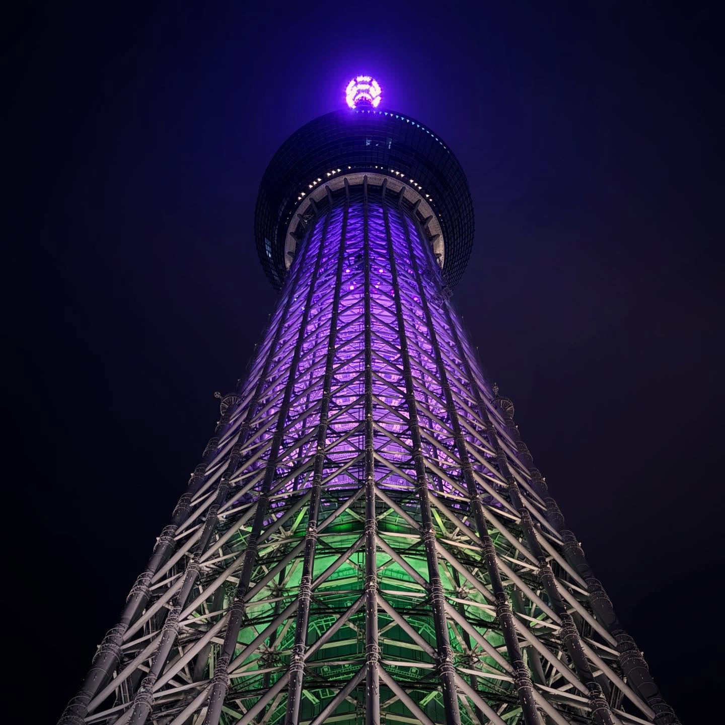 Looking up through Tokyo Skytree’s illuminated structure.