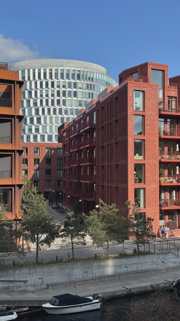 Reel cover showing contemporary buildings beside the Nordhavn waterfront.