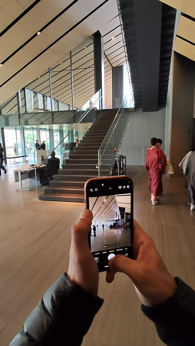 Reel cover showing a tall, daylit Japanese interior and staircase.