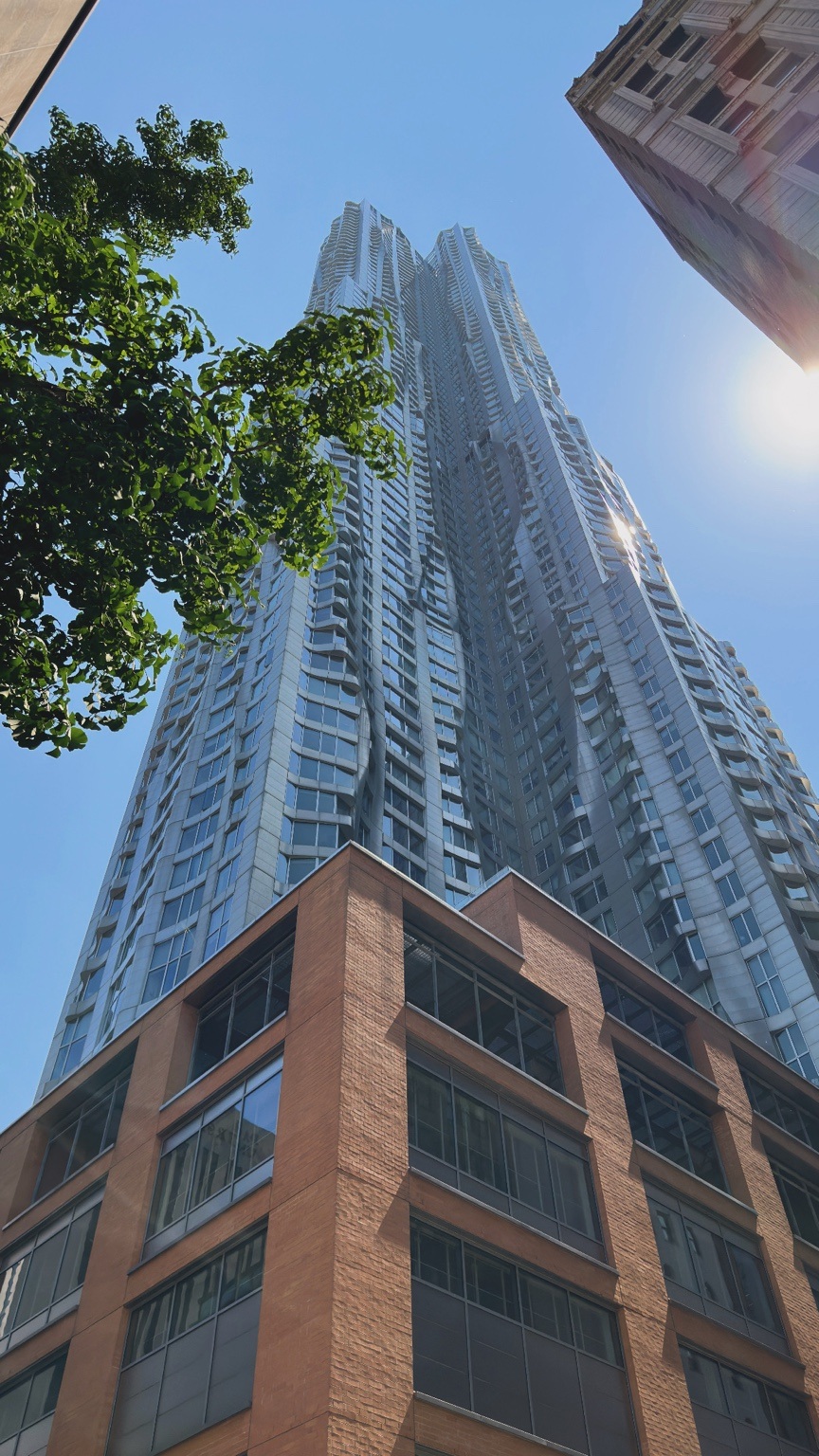 A rippling tower façade. Midtown and Lower Manhattan.