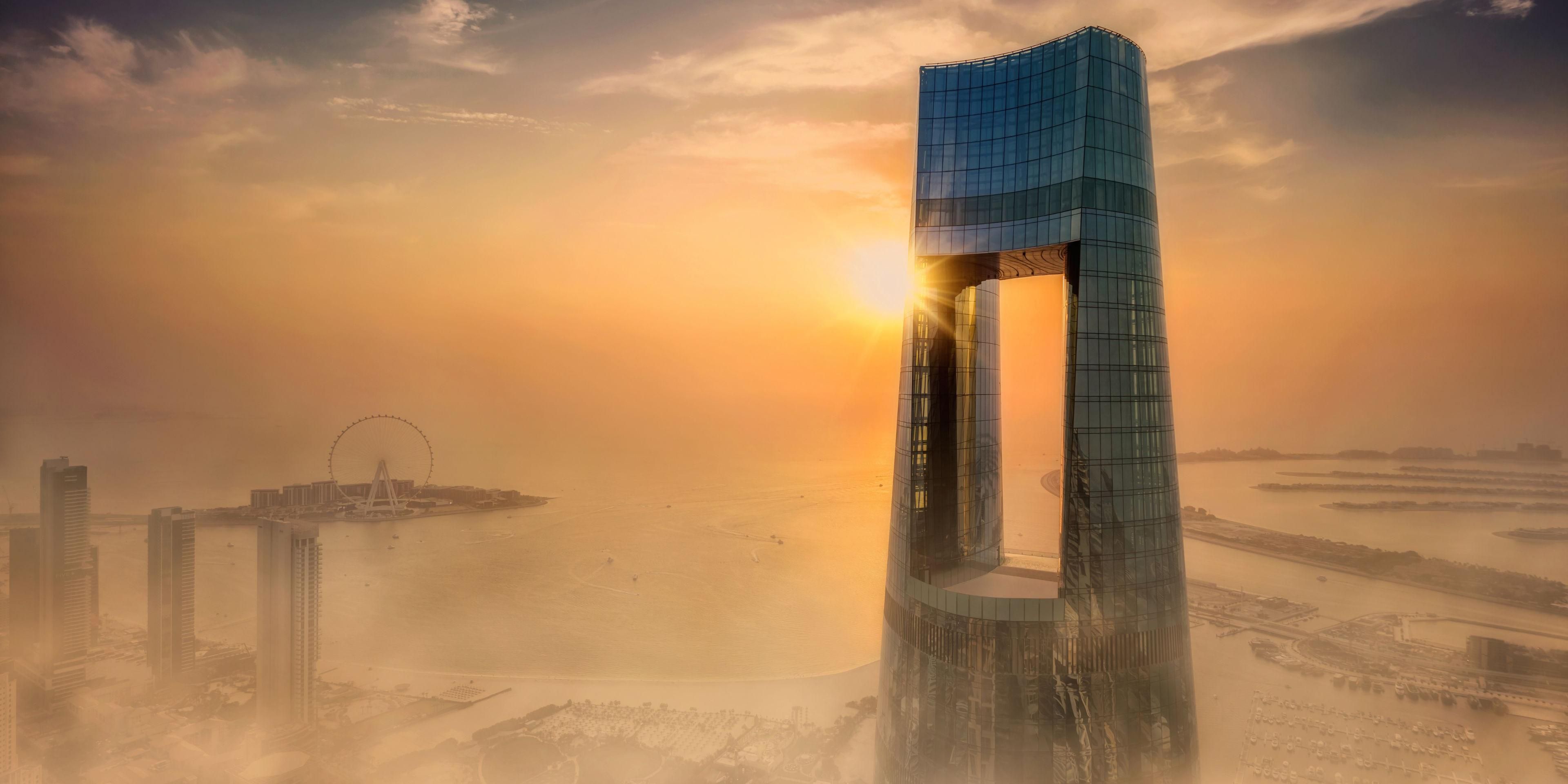 Ciel Dubai Marina — Crown and Marina at sunset / Official IHG hotel imagery