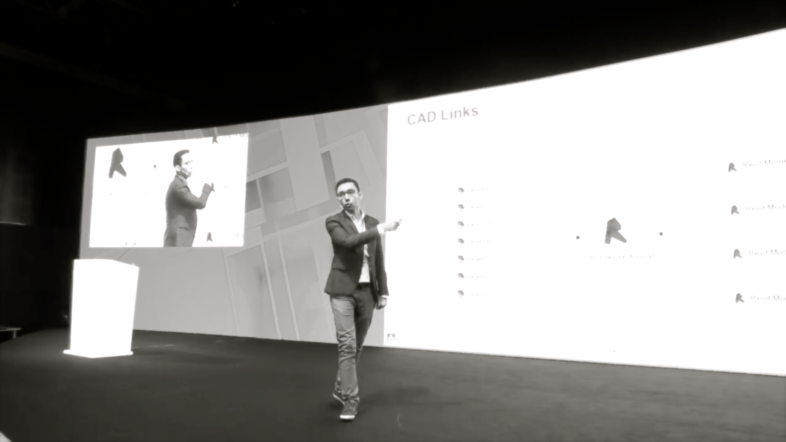 Tamer Tageldin presenting material on a screen.