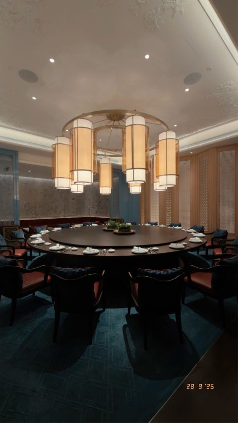 Warm light above the dining table